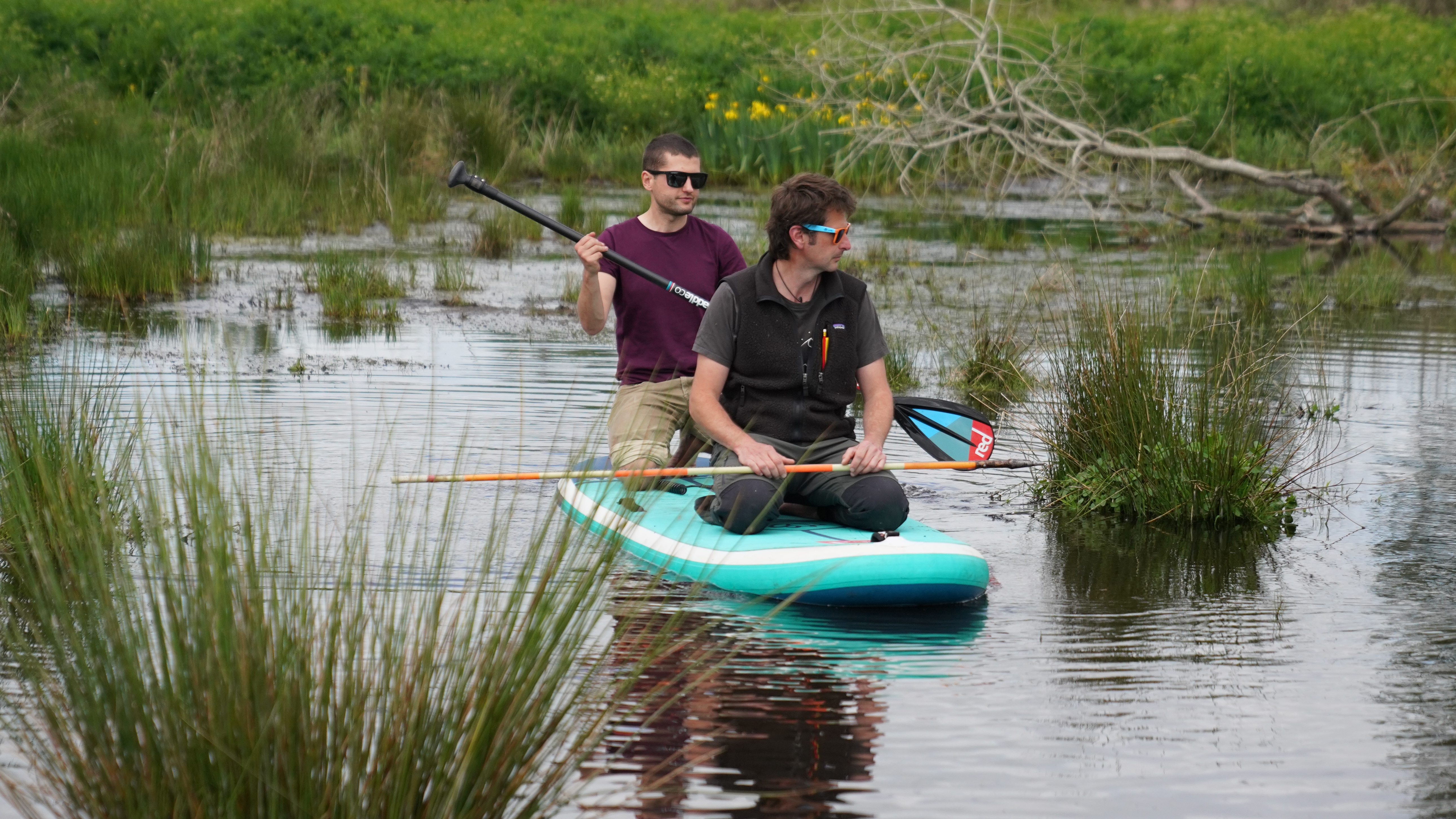 Alan Puttock and Richard Brazier measure the holding capacity of a beaver pond